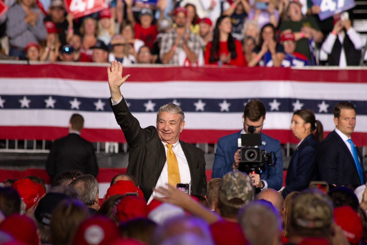 Tommy Thompson waves to the crowd at the rally