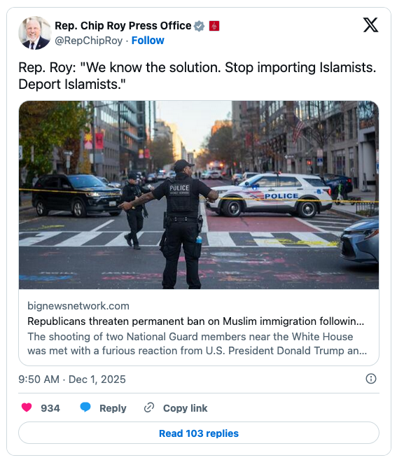 A police officer directs traffic in a city street while police cars are parked nearby, indicating a response to an incident. There are pedestrians in the background and a sense of an ongoing law enforcement situation.