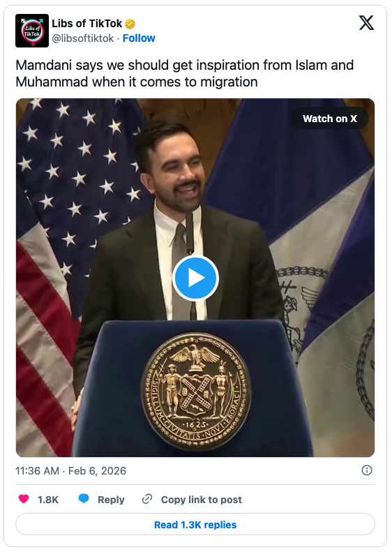 A speaker addressing an audience, discussing migration and referencing Islam and Muhammad, with the New York City seal in the foreground.
