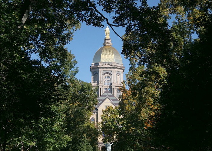 Notre Dame's Golden Dome topped by the statue of the Virgin Mary.