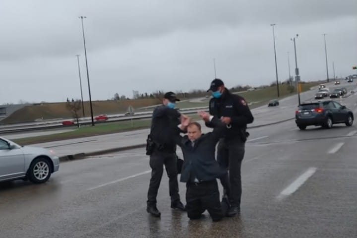 Police Surround Calgary Pastor on Busy Highway, Arrest Him for “Inciting” People to Go to Church