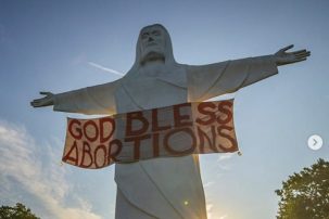 SICK: Pro-abortion Group Hung “God Bless Abortions” Banner on the Christ of the Ozarks Statue
