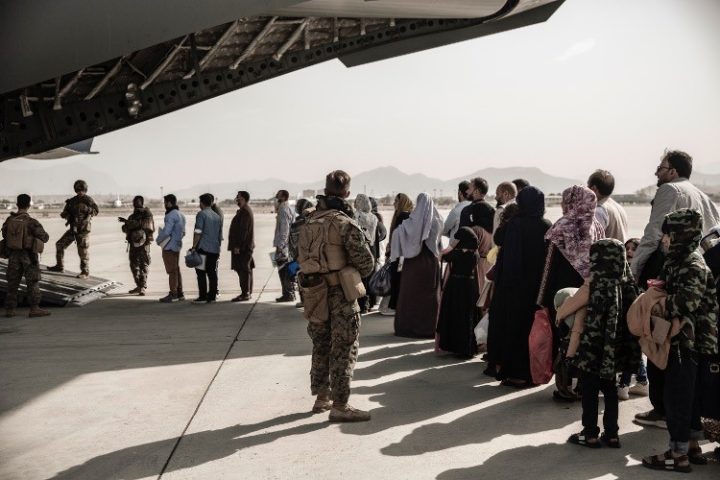 Biden Ordered Unvetted Afghans Onto Planes Out of Kabul. Ignored Security, Packed Them In