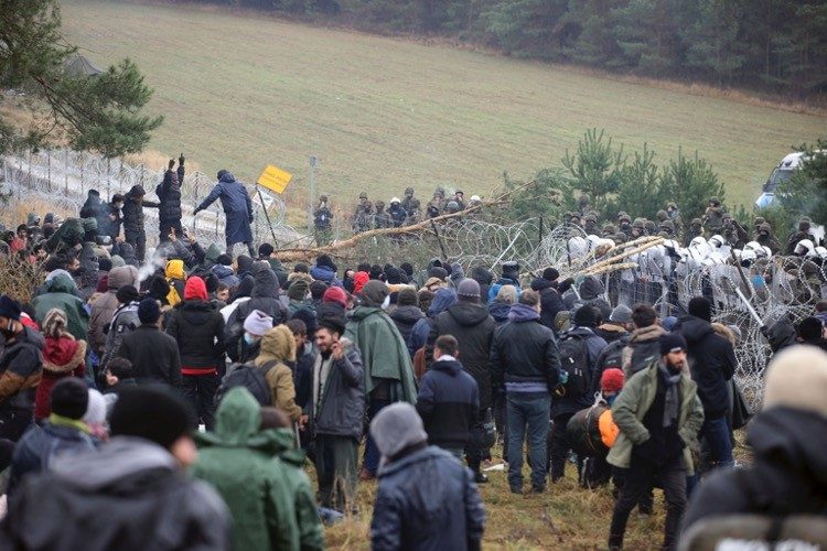 Thousands of Muslims Rush Polish Border; Military Is Deployed, Shots Fired