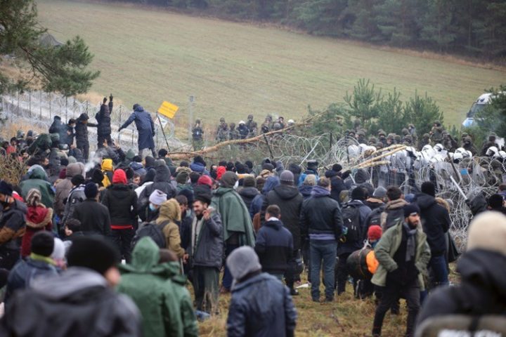 Thousands of Muslims Rush Polish Border; Military Is Deployed, Shots Fired