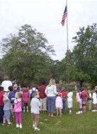 Secular Group Demands Halt to School’s Flagpole Prayer Meeting