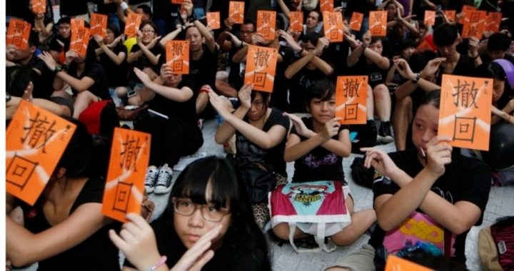 Hong Kong Votes Amid Protests Against Beijing’s Communist “Brainwashing”