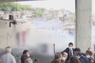 Smoke Bomb Hurled at Japanese PM During Outdoor Event, Motives Unclear