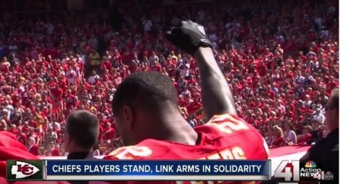 Clenched Fist Raised During National Anthem