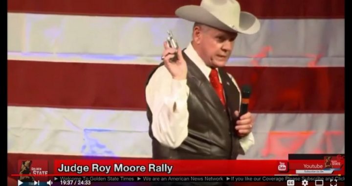 U.S. Senate Candidate Roy Moore Pulls Gun at Campaign Rally