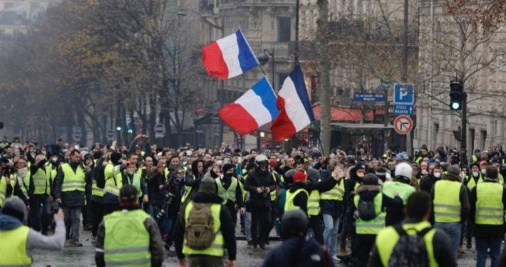 Macron Blinks in Face-off With “Yellow Vest” Protesters