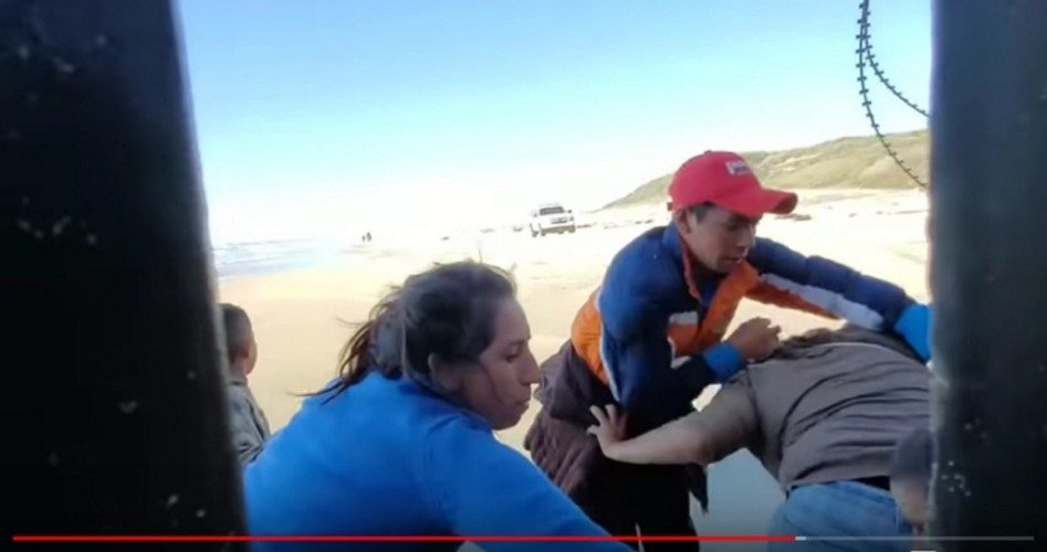 Video Catches Dozens of Illegal Immigrants Breaching Border Barrier Near San Diego