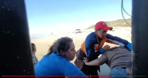 Video Catches Dozens of Illegal Immigrants Breaching Border Barrier Near San Diego