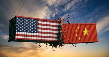 Rhetoric Escalates in Trade War as Trump Targets Huawei