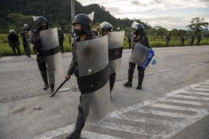 Guatemala Stops COVID Caravan Cold. Hondurans Bused Back Home.
