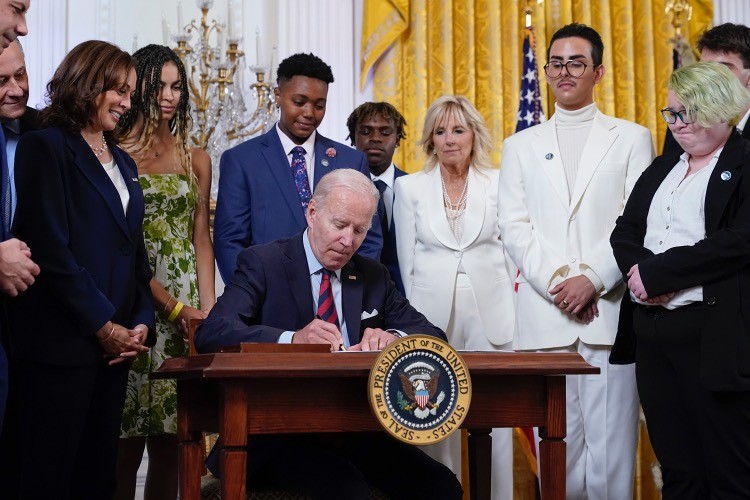 Biden Signs Executive Order to Counter “Attacks” on LGBTQ Rights, Transgender Youth