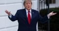 Donald Trump gestures outside the White House